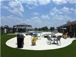 Community patio with barbeque and seating - thumbnail