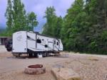 A trailer parked with a table at the site at SMOKY MOUNTAIN PREMIUM CAMPING - thumbnail