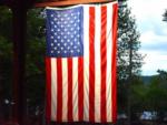 An American flag hanging at SMOKY MOUNTAIN PREMIUM CAMPING - thumbnail