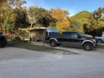 Airstream in site near picnic table at LOST MAPLES RV AND CAMPING - thumbnail