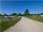 A gravel road that leads to RV sites - thumbnail