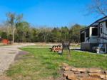 Site with picnic bench at SHOULD BE FISHING CAMPGROUND - thumbnail