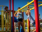 Kids playing at the playground at SANDUSKY RV RESORT - thumbnail