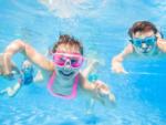 Kids swimming under water at SANDUSKY RV RESORT - thumbnail