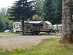 Trailer in RV site at Cougar RV Park & Campground - thumbnail