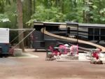 Parked RV at site Cougar RV Park & Campground - thumbnail