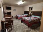 Two beds in a cabin at The Bunkhouse Cabins and RV Park - thumbnail