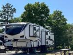 Parked trailer at site Wheelers RV Park - thumbnail