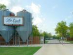 Campground entrance with silos at SILO CREEK RV RESORT - thumbnail