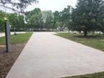 Empty RV lot near light and trees at SILO CREEK RV RESORT - thumbnail