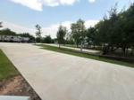 Side view of empty RV lot at SILO CREEK RV RESORT - thumbnail