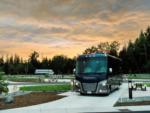 Class A motorhome in a paved site at ANGEL OF THE WINDS CASINO RESORT - thumbnail