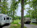 Gravel sites by trees at MOUNTAIN TOP RV PARK - thumbnail