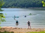 Four kayakers paddling out at KINZUA EAST KAMPGROUND - thumbnail