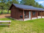 Deluxe Cabin with outdoor seating and fire ring at GOLD VALLEY CAMP - thumbnail