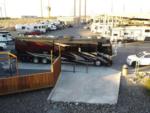 Big rig and other RVs nearby at NOMADLAND RV STAY - thumbnail