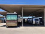 RVs under covered parking at NOMADLAND RV STAY - thumbnail