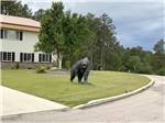 A bear statue in front of the office at CanAmerican 85 RV Park - thumbnail