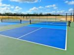 Tennis courts on grounds at WATERSIDE RV RESORT - thumbnail