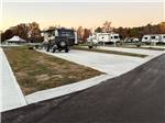 RVs parked in paved sites at The Farm RV Resort - thumbnail