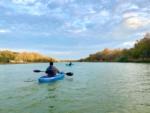 Man kayaking on the river at RIVER'S EDGE CAMPGROUND - thumbnail