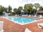 Pool with water umbrella at RIVER MEADOW CAMPGROUND - thumbnail