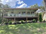 Exterior of a stilt house rental at FARM OF DREAMS RESORT - thumbnail