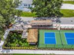 Aerial view of the tennis courts at HARBOR VIEW ON THE BAY - thumbnail