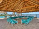 Covered seating with outdoor sofas at HARBOR VIEW ON THE BAY - thumbnail