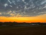 View of sunset at ROCK WALL RV PARK - thumbnail