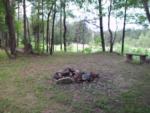 Stones for a fire pit in a tent site at PINE RIDGE RV PARK - thumbnail