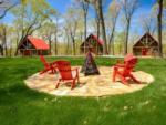 Seating around a fire pit near cabins at Marina Del Rey Resort - thumbnail