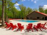 Pool with red chairs at site Marina Del Rey Resort - thumbnail