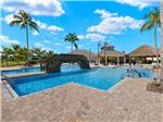 Pool with walking bridge at Laguna Caribe - thumbnail