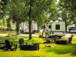 Fire pit and chairs at LAKESHORE CABINS AND CAMPGROUND - thumbnail