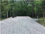 A gravel site with table and grill - thumbnail