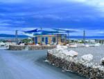 Large blue shade sails over an office at COTTONWOOD SPRINGS RV RESORT - thumbnail