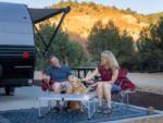 At a table with a dog at BEST FRIENDS RV PARK - thumbnail