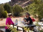 Drinking at a table at BEST FRIENDS RV PARK - thumbnail