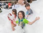 Kids playing in bubbles at CAMP FIMFO WACO - thumbnail