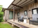 Wooden porch at CAMP FIMFO WACO - thumbnail