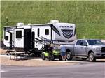 A travel trailer at a site - thumbnail