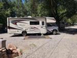 Motorhome in site at OAK CREEK MOBILODGE - thumbnail