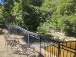 Seating overlooking the creek at OAK CREEK MOBILODGE - thumbnail