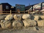 Park sign next to RV at SKYLINE TRAILS RV PARK - thumbnail