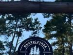Welcome sign at site Rustic Pine RV Park 55+ - thumbnail