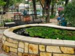 An amber stone koi pond at OUR FRIENDS CAMPGROUND - thumbnail