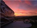 RV at site with a sunset view - thumbnail