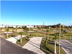 Sites surrounded by grass at Galveston Island RV Park - thumbnail