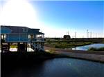 The office building near the pond at Galveston Island RV Park - thumbnail